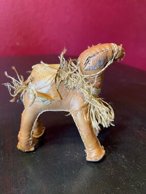 Vintage hand-stitched leather camel figurine